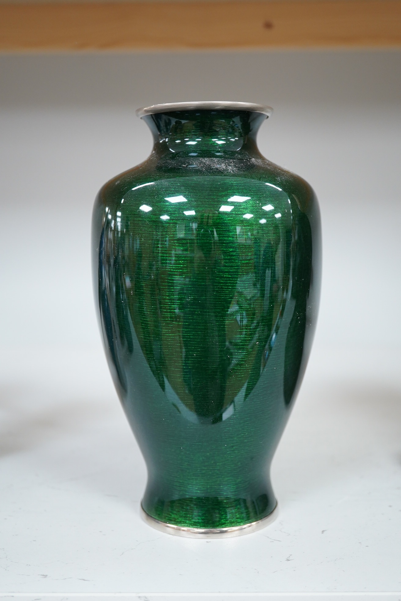 A mid 20th century Japanese green prunus silver wire cloisonné enamel vase, by Ando, 19cm high., Condition - good